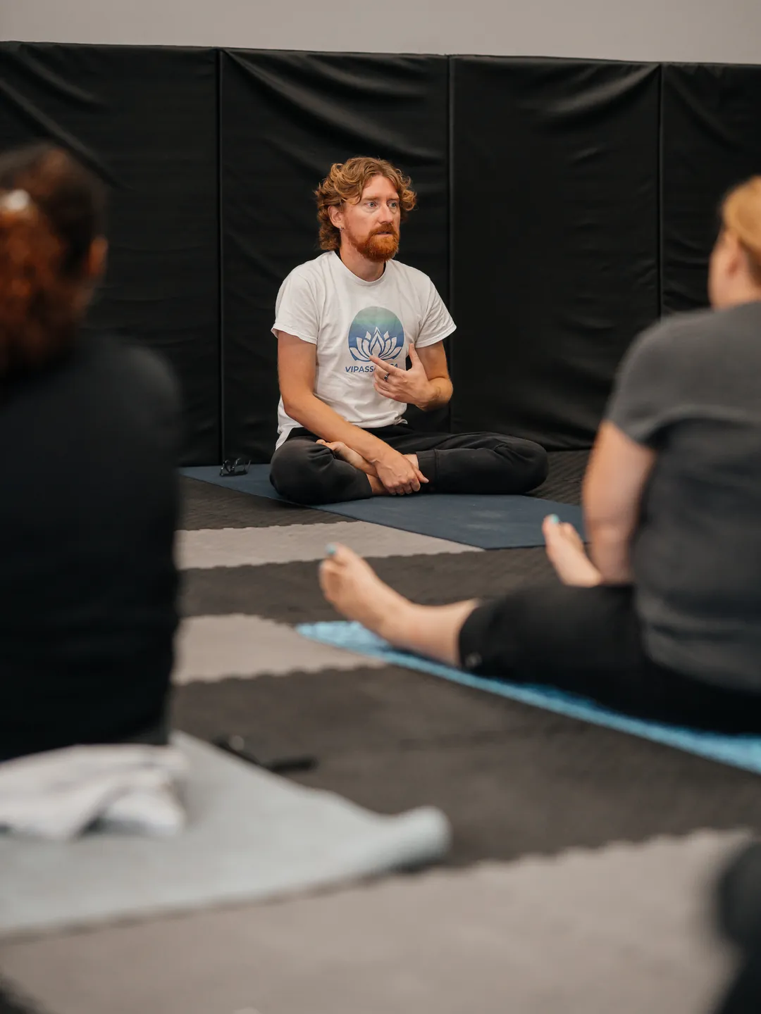 Artem Rusinov guiding a one day silent retreat in Edmonton: teacher explaining Vipassana meditation to the group